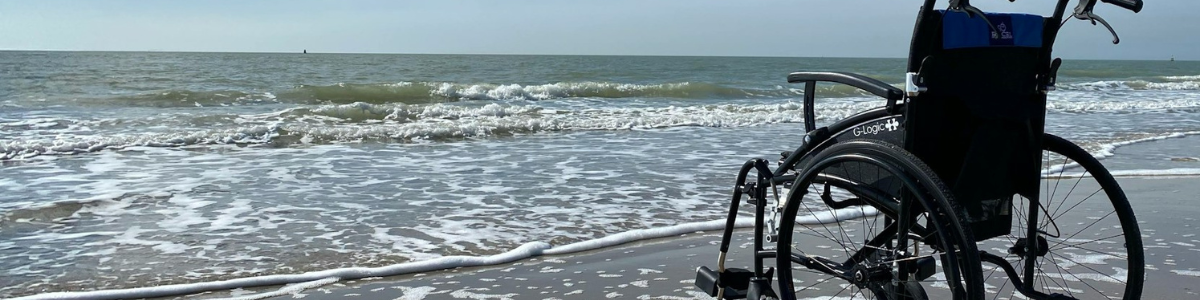 Wheelchair facing the ocean