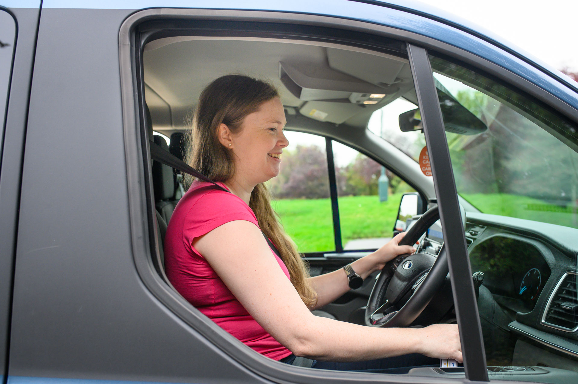 Woman driving an ora mobility vehicle – wavs, adapted cars and more